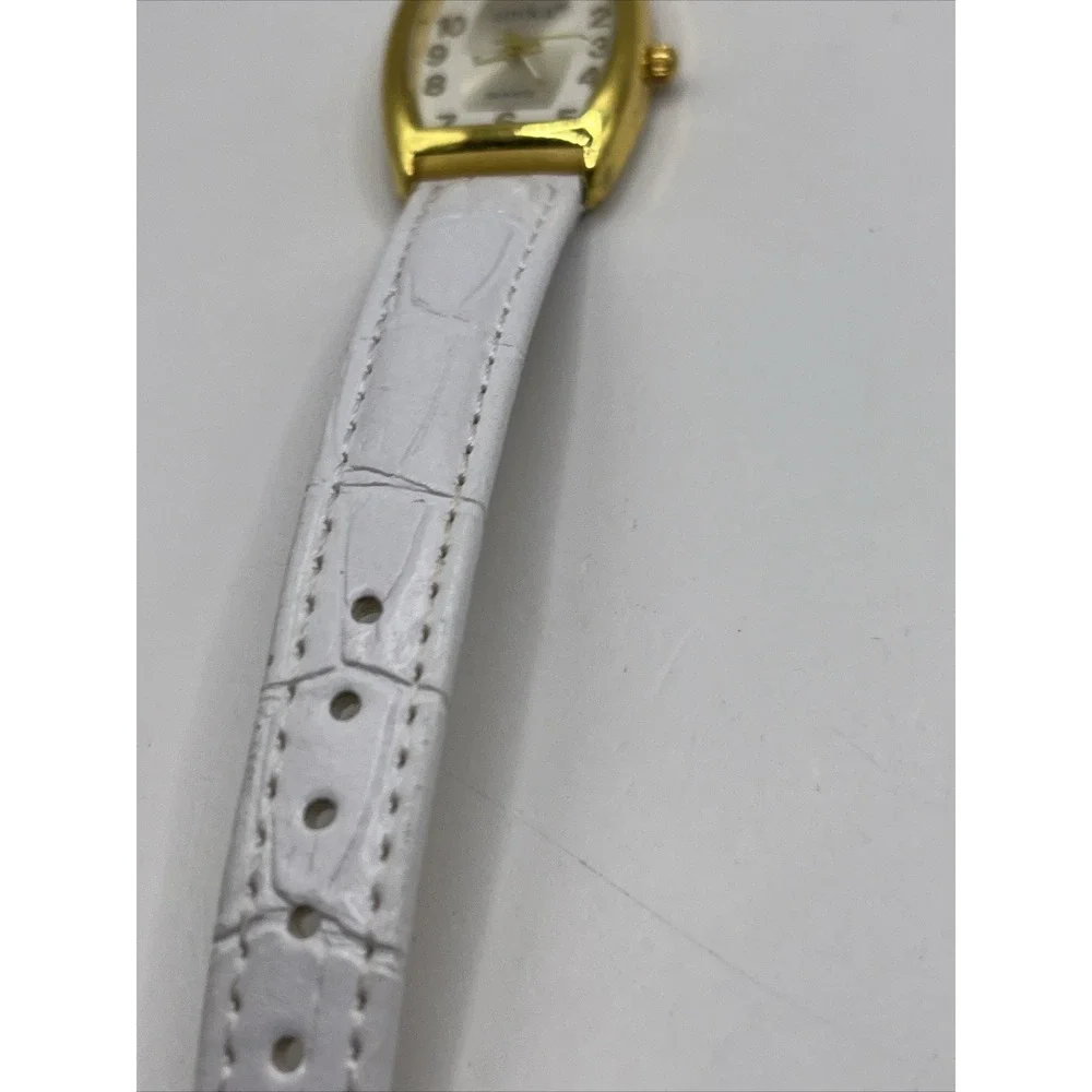 Unika Women's Quartz Watch Gold Tone Case White‎ Leather Band- New Battery